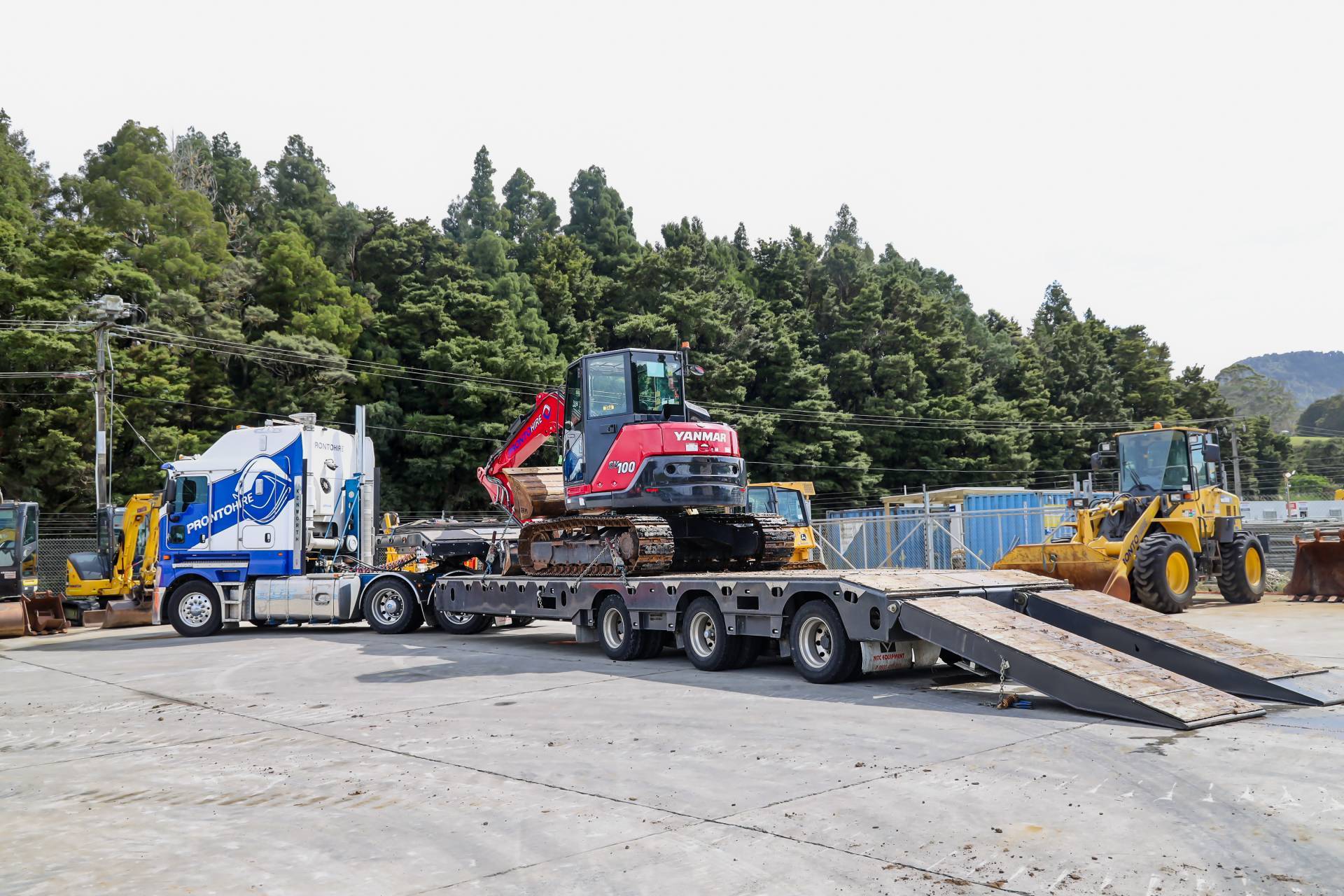 10 Ton Excavator for hire from Pronto Hire Auckland on a transport truck at warkworth