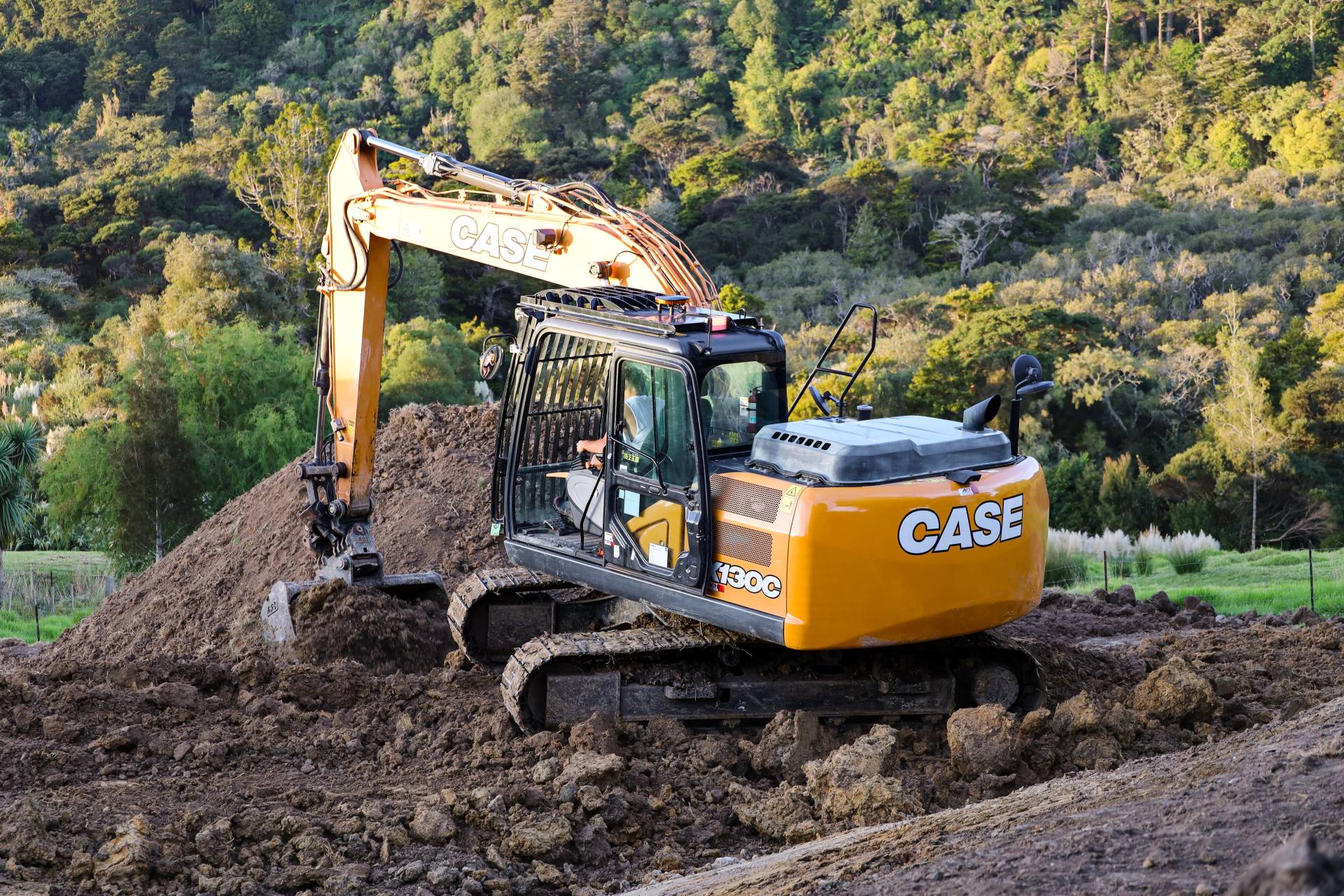 Case 13 Ton Excavator Conventional Swing for Hire from Pronto Hire Auckland Digging on a residential site