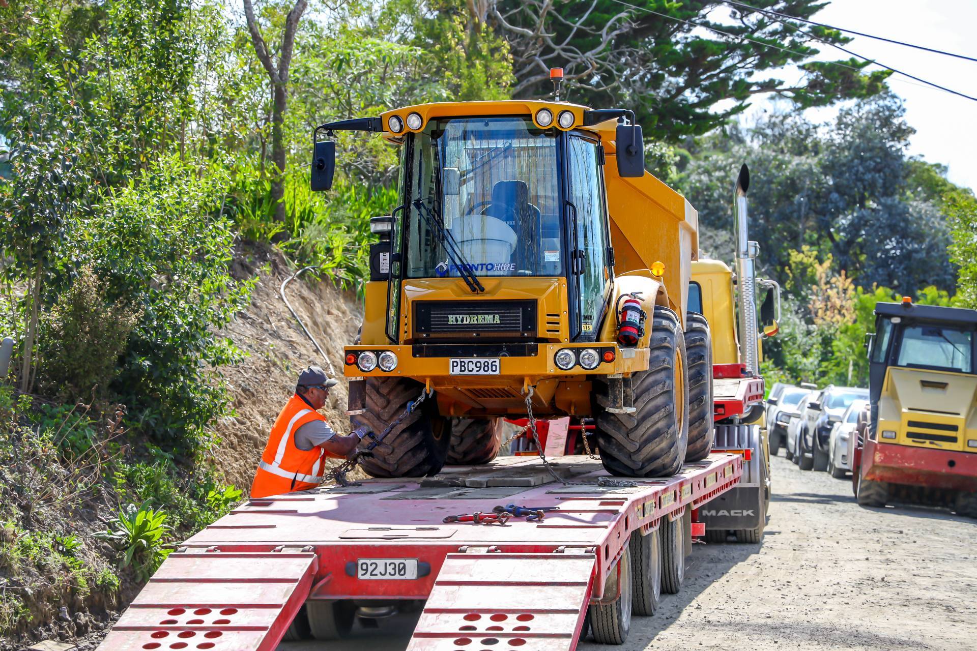 Hydrema 912HM 12 Ton Articulated Dumper for hire from Pronto Hire Auckland on a transport truck