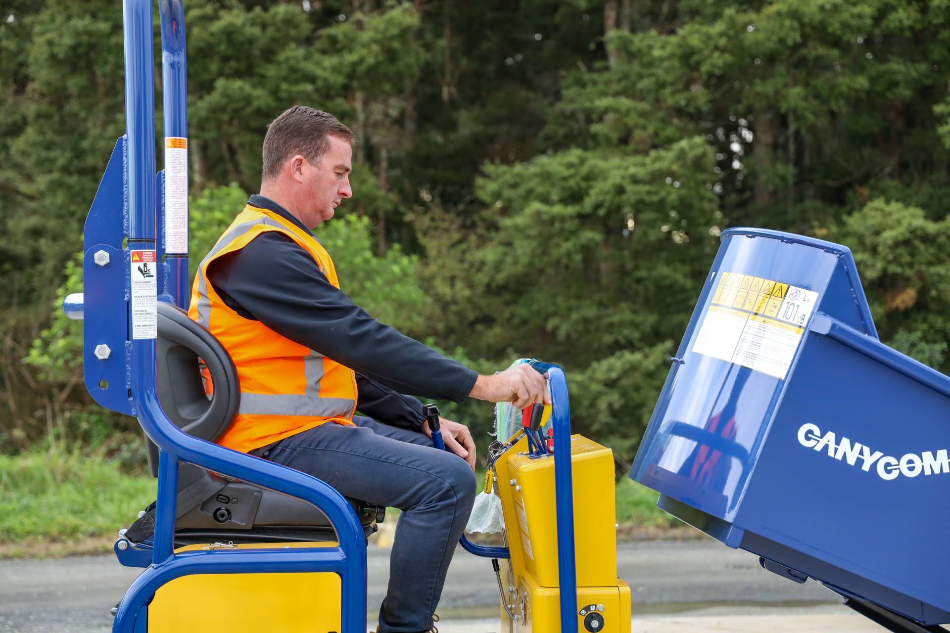 Canycom 1.2 Ton Track Dumper Swivel Tip for hire from Pronto Hire Auckland being operated by driver